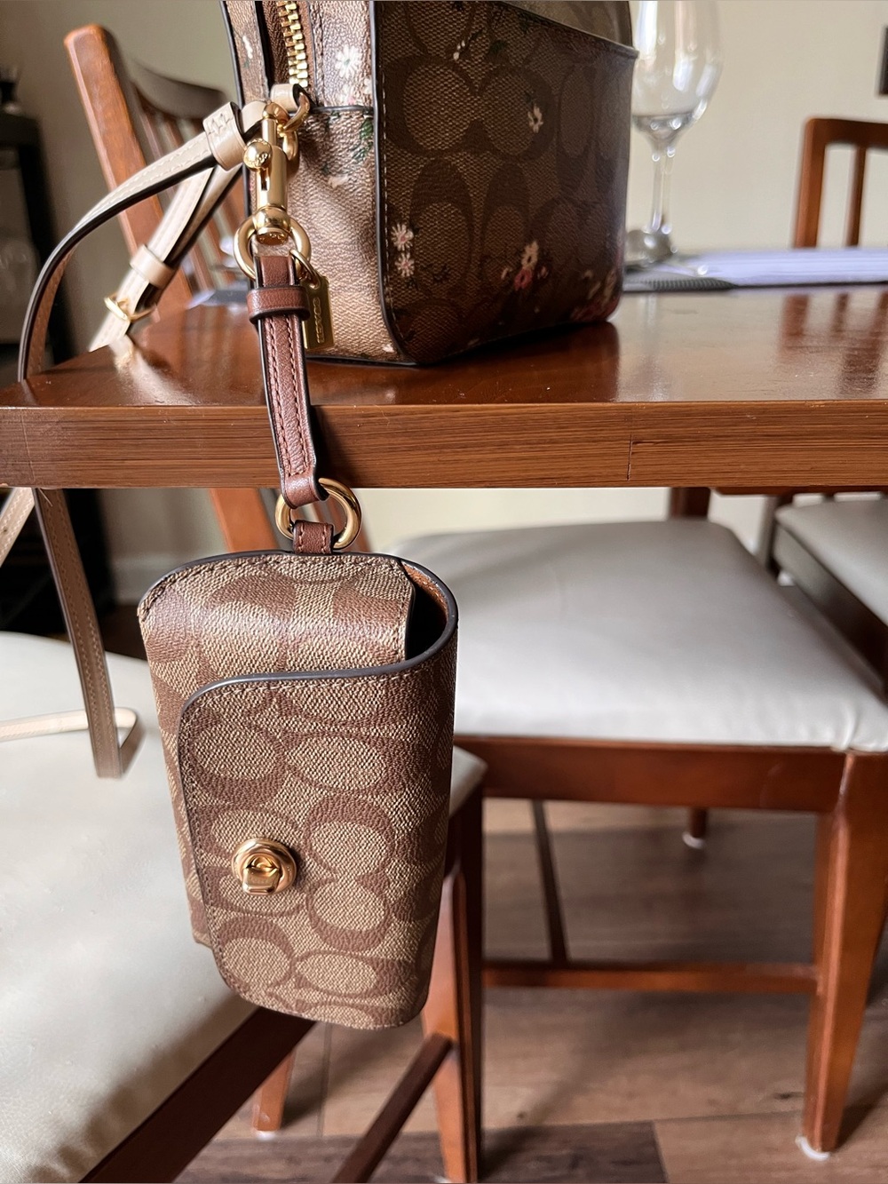 Coach glasses pouch in Signature khaki/tan! Clip on your bag or belt loop!